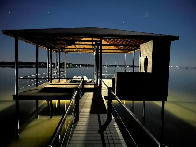 dock area featuring a water view