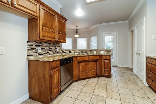 kitchen with sink, light stone counters, stainless steel dishwasher, pendant lighting, and decorative backsplash