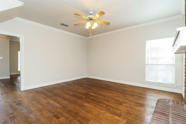 unfurnished room with dark wood-type flooring, ornamental molding, and ceiling fan