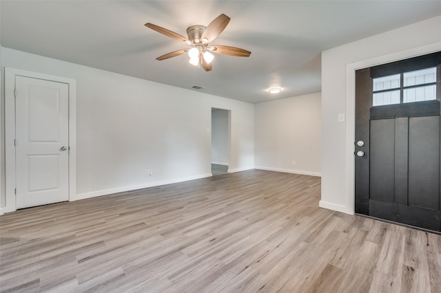 foyer entrance featuring ceiling fan and light hardwood / wood-style floors