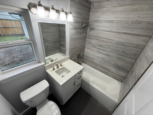 full bathroom with  shower combination, toilet, and vanity