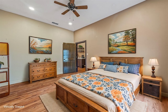 bedroom featuring ceiling fan and light wood-type flooring