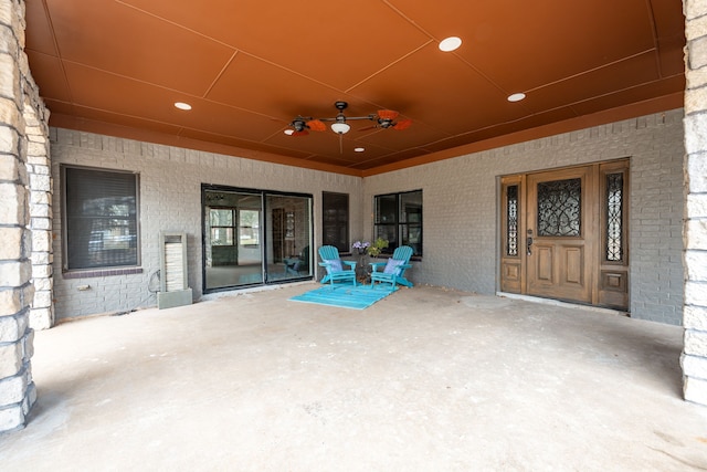 view of patio with ceiling fan