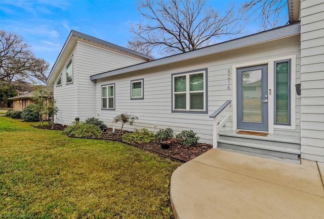 exterior space featuring a front lawn