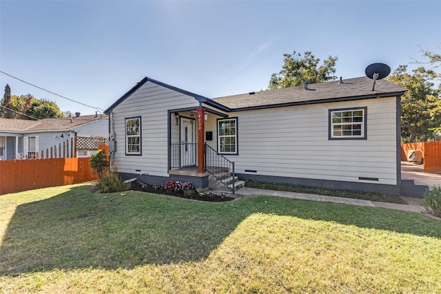 view of front of property with a front lawn