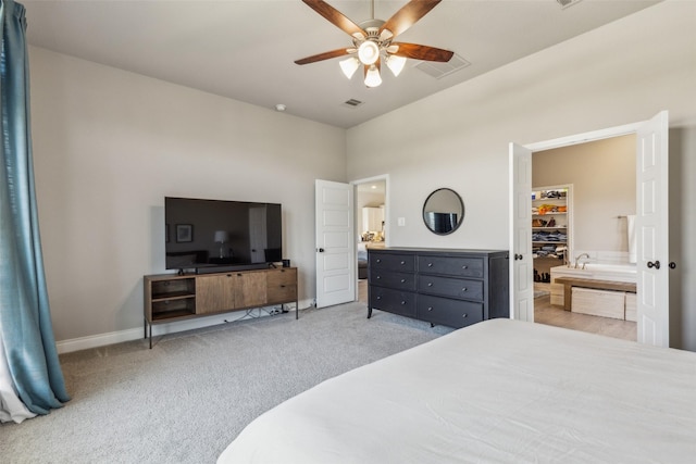 bedroom featuring light carpet and ceiling fan