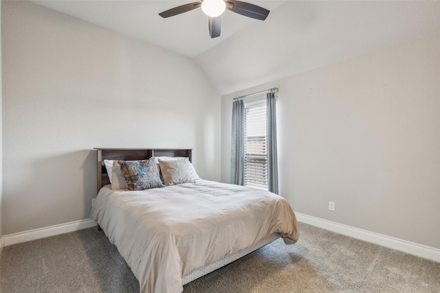 bedroom featuring vaulted ceiling, ceiling fan, and carpet flooring