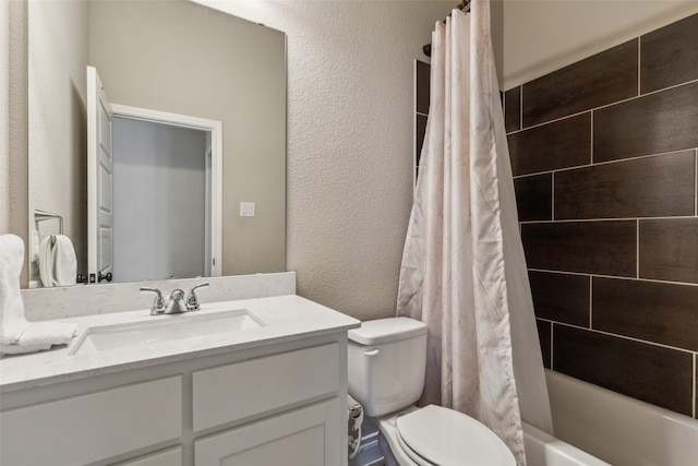 full bathroom featuring vanity, shower / bath combo, and toilet