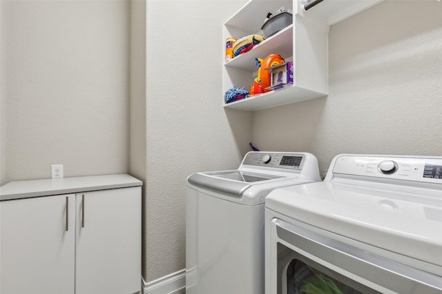 laundry area featuring independent washer and dryer