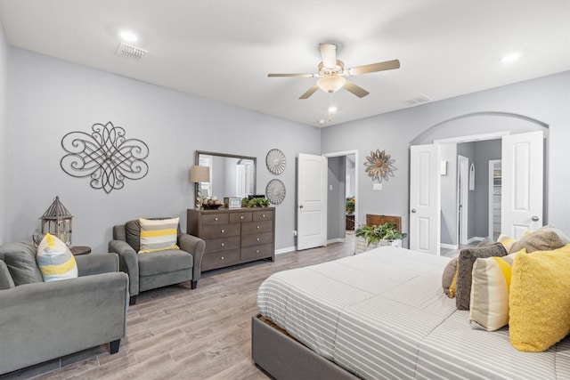 bedroom featuring ceiling fan and light wood-type flooring