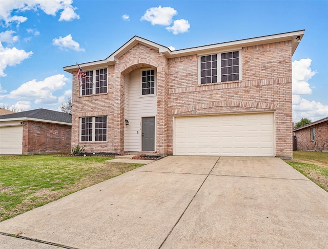 front facade with a garage and a front yard