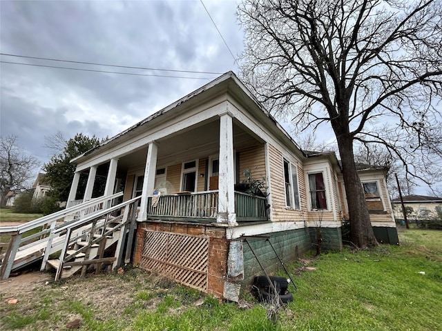 view of home's exterior featuring a porch