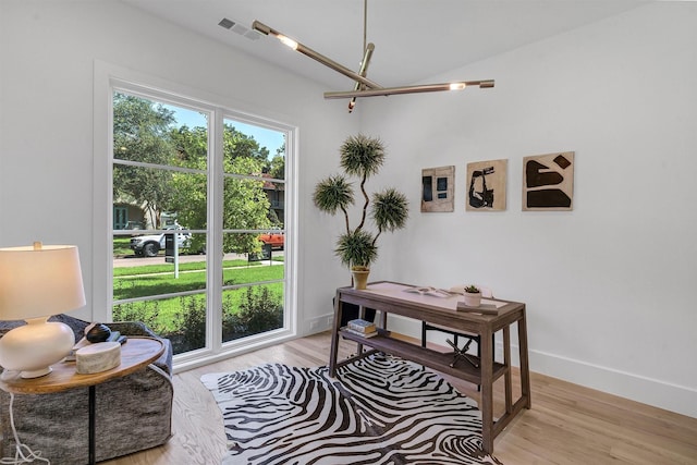 sitting room with light hardwood / wood-style floors