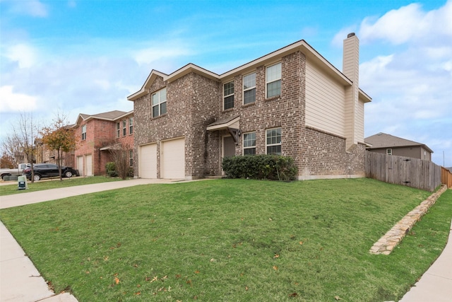 view of front facade featuring a garage and a front yard