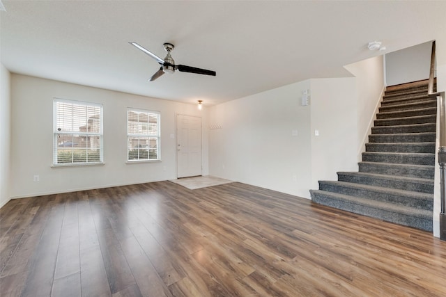 spare room featuring hardwood / wood-style flooring and ceiling fan