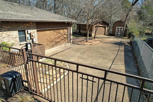 view of patio / terrace featuring a shed