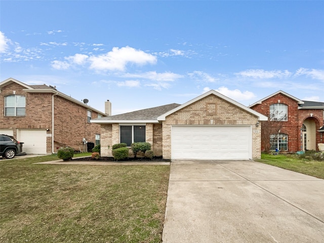 view of front of home with a garage and a front yard