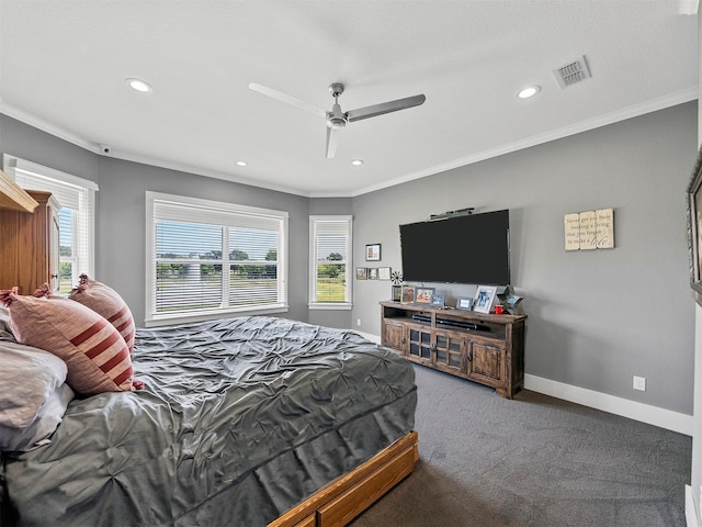 bedroom featuring crown molding, carpet flooring, and ceiling fan