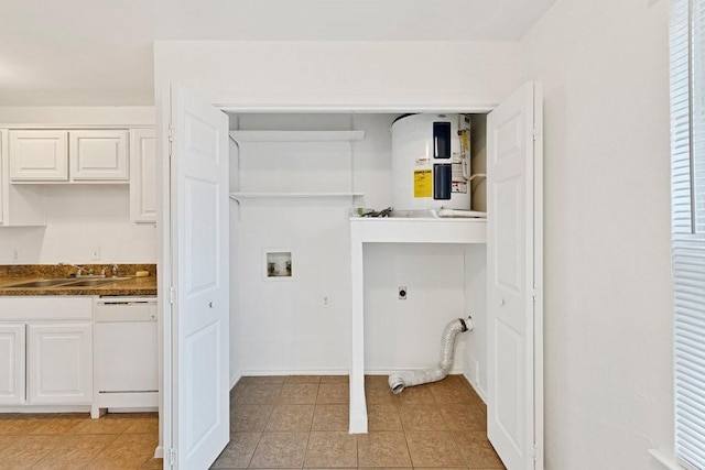 laundry room featuring light tile patterned floors, hookup for a washing machine, hookup for an electric dryer, laundry area, and a sink