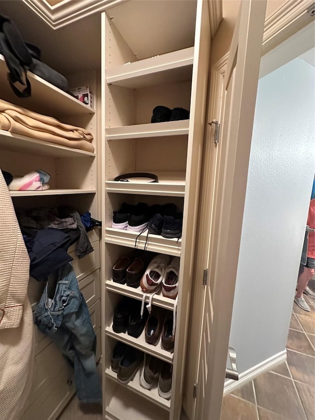 spacious closet with tile patterned flooring