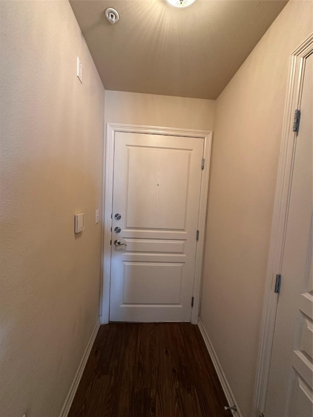 doorway to outside featuring dark hardwood / wood-style floors