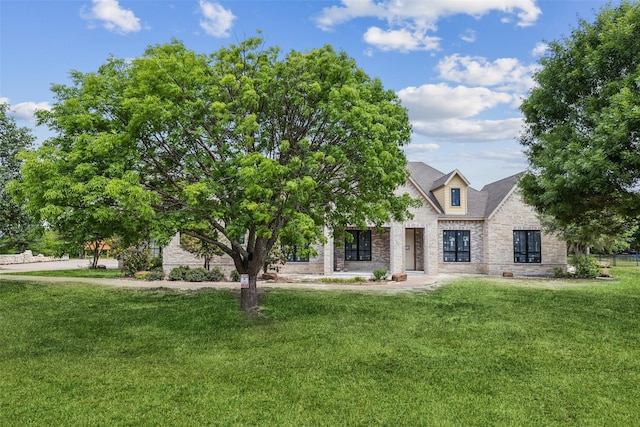 871 Beechwood Ln, Fairview, TX 75069 - view of front facade with stone siding and a front yard