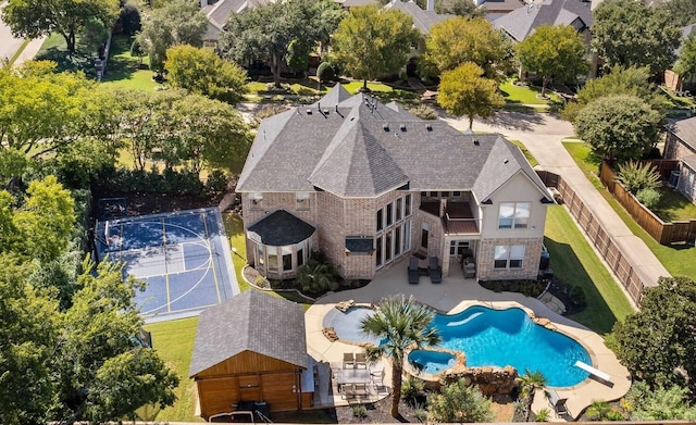 view of pool featuring a patio area