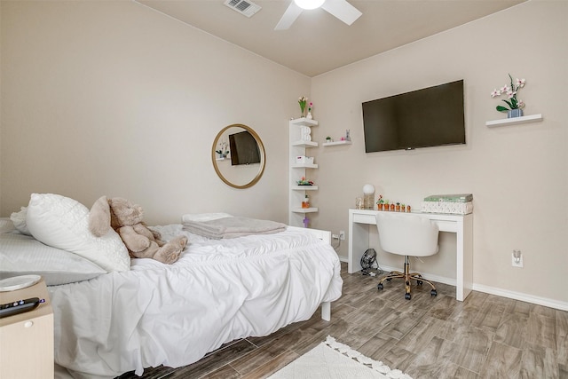 bedroom featuring ceiling fan and wood-type flooring