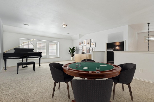 rec room featuring visible vents, baseboards, and carpet flooring