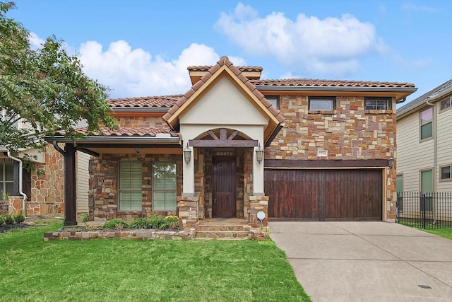 view of front facade featuring a front lawn, stone siding, fence, concrete driveway, and a tiled roof