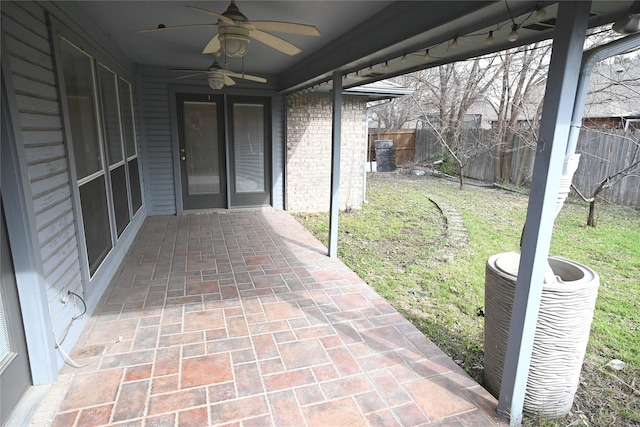 view of patio featuring cooling unit and ceiling fan