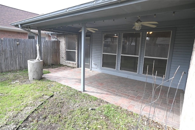 view of patio featuring ceiling fan