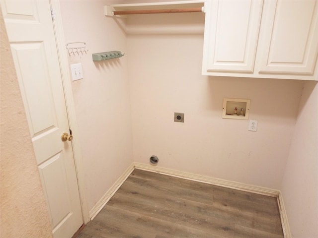 laundry room with cabinets, electric dryer hookup, dark wood-type flooring, and washer hookup