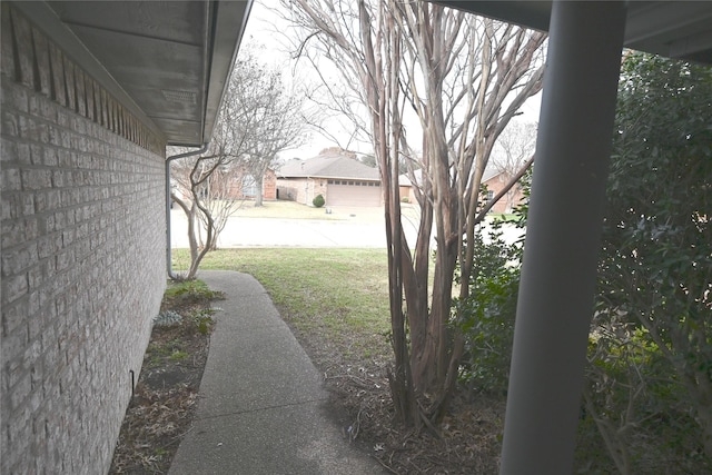 view of yard featuring a garage