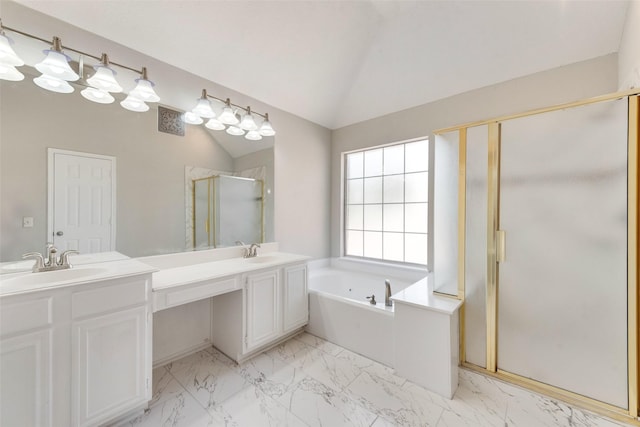 bathroom with lofted ceiling, vanity, and separate shower and tub