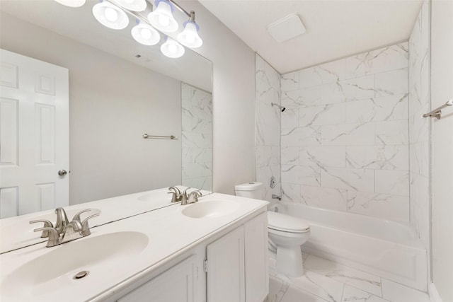 full bathroom with vanity, toilet, and tiled shower / bath combo