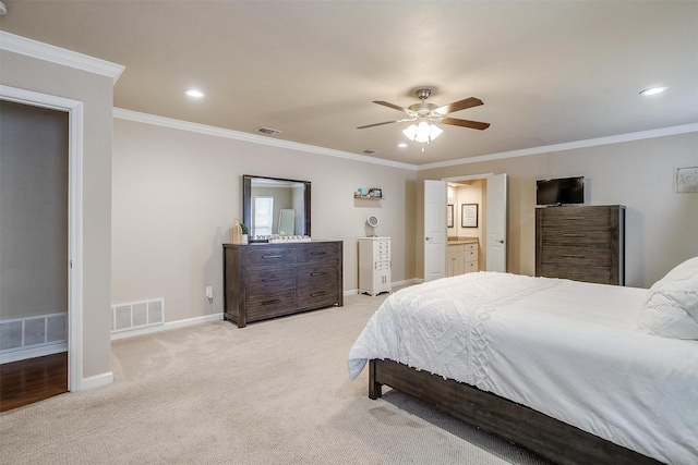 carpeted bedroom featuring ceiling fan and ornamental molding