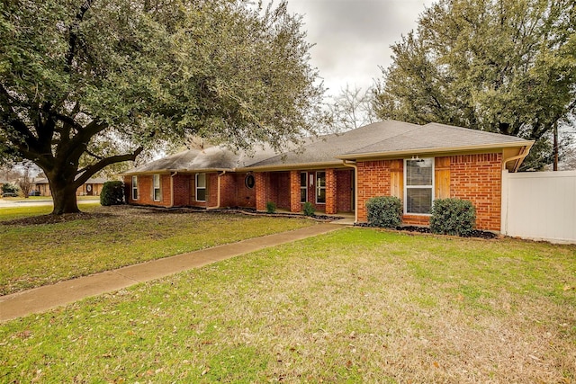 ranch-style house with a front yard