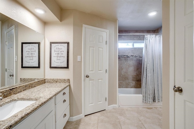 bathroom with vanity and shower / bathtub combination with curtain