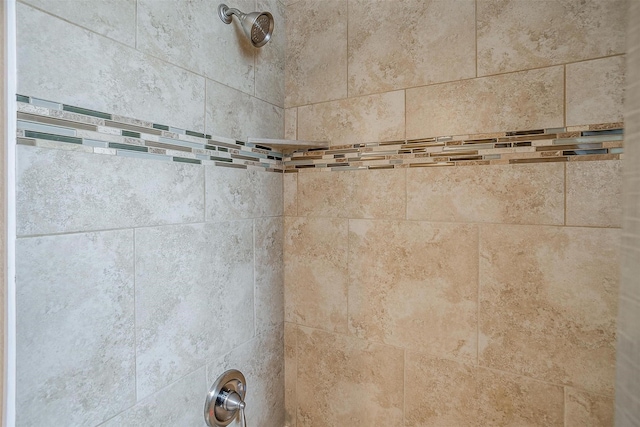 details with a tile shower