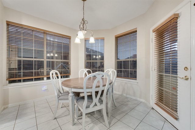 dining space with light tile patterned flooring