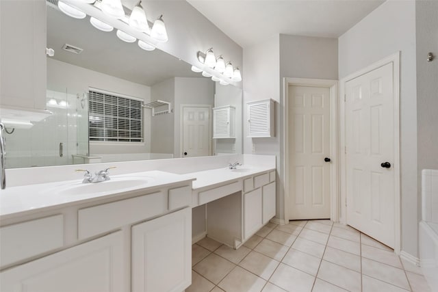 bathroom with tile patterned floors, independent shower and bath, and vanity