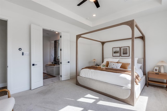 bedroom with ceiling fan and light carpet