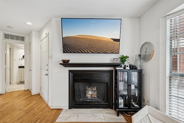 interior details with hardwood / wood-style flooring