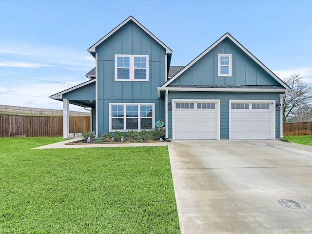 view of front of home with a garage and a front lawn