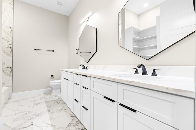 full bathroom with vanity, tub / shower combination, and toilet