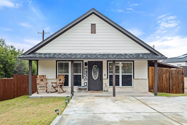 932 Devils River Dr, Granbury, TX 76048 - view of front of property featuring a porch and a shingled roof