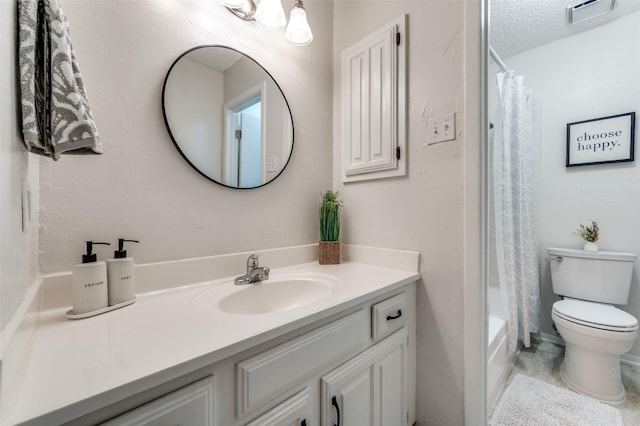 full bathroom with vanity, shower / tub combo with curtain, a textured ceiling, and toilet