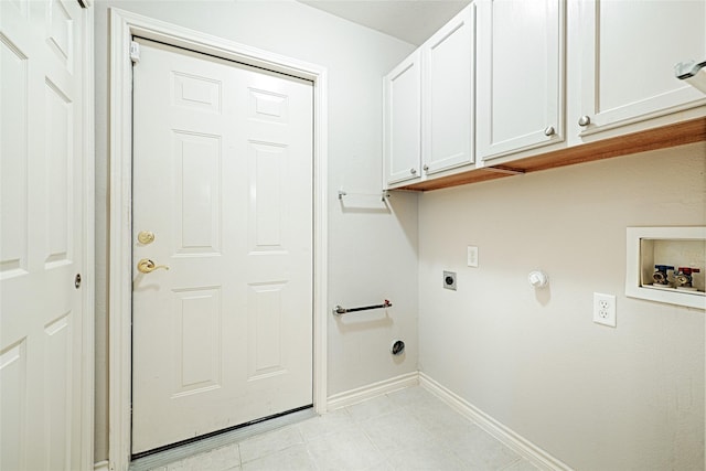 washroom featuring gas dryer hookup, cabinets, hookup for a washing machine, and electric dryer hookup