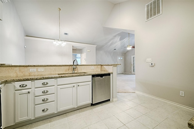 kitchen featuring sink, dishwasher, light stone counters, white cabinets, and decorative light fixtures